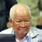 Khieu Samphan former Khmer Rouge head of state sits in a cour
