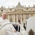 Pope Francis delivers his blessing as he leaves St Peters square