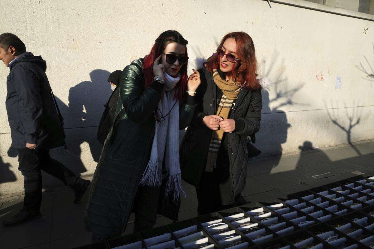 Iran Women without wearing mandatory Islamic headscarf