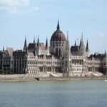 The Parliament Building appears along the Danube River in Budapest