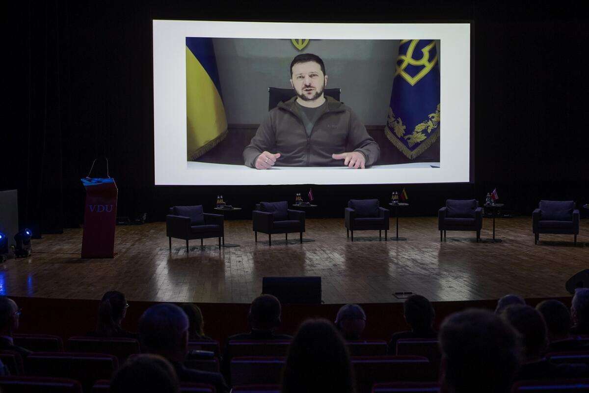 President of Ukraine Volodymyr Zelensky speaks via a video link