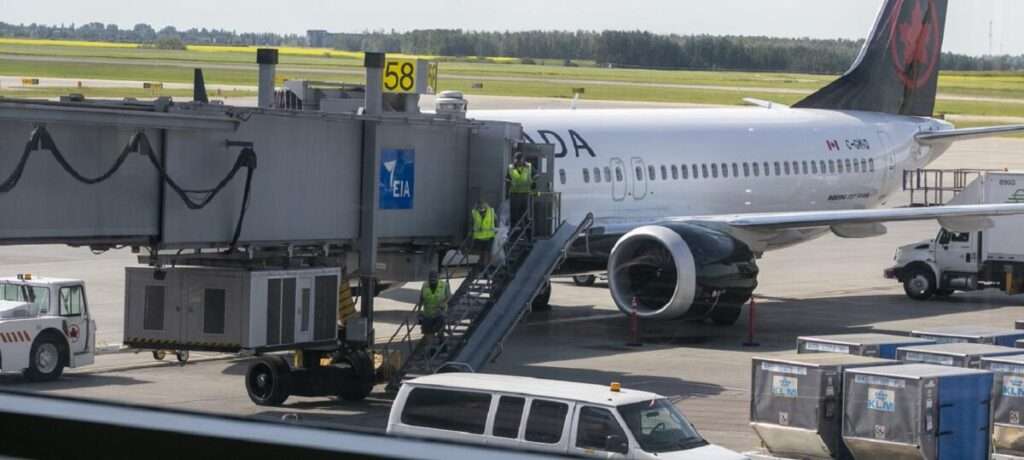 A Boeing 737 MAX plane is at Edmonton International Airport in Alberta