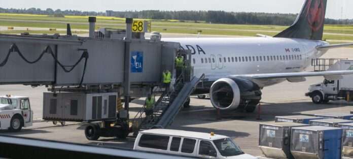 A Boeing 737 MAX plane is at Edmonton International Airport in Alberta