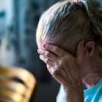 Sad senior old woman Lonely from loss or sick with headache Upset patient in retirement home with stress or pain Alzheimer, depression, senility or dementia