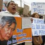 Supporters of jailed former President Alberto Fujimori shouts slogans