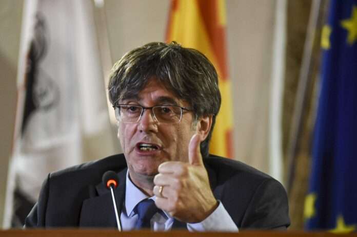 Catalan leader Carles Puigdemont speaks at a press conference