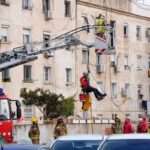 Spain Bandalona Firefighters inspect building from a ladder
