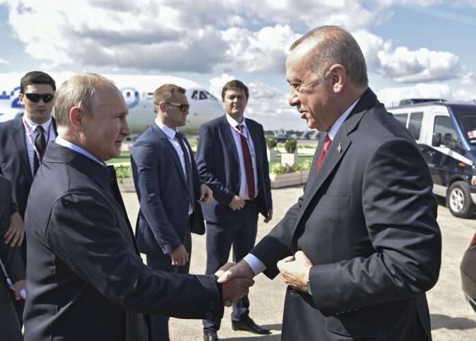 Vladimir Putin left and Turkish President Recep Tayyip Erdogan