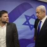 Prime Minister Benjamin Netanyahu right talks with Finance Minister Bezalel Smotrich