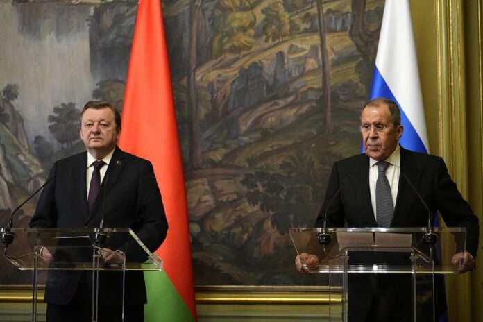 Russian Foreign Minister Sergey Lavrov right and Belarusian Foreign Minister Sergei Aleinik