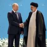 Russian President Vladimir Putin left and Iranian President Ebrahim Raisi