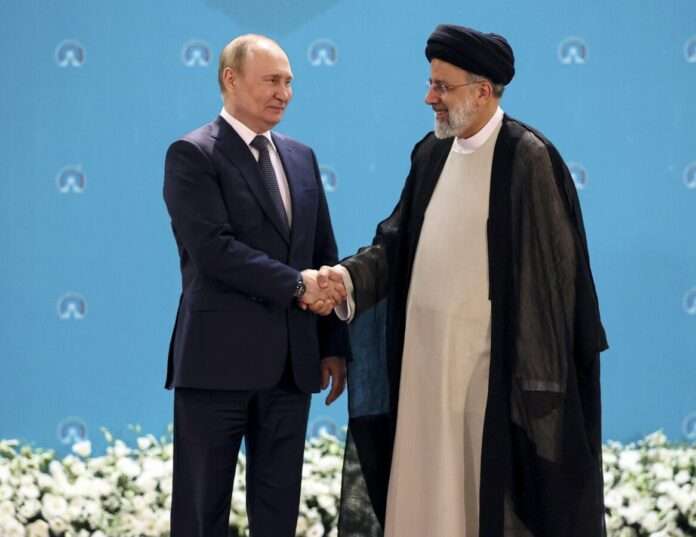 Russian President Vladimir Putin left and Iranian President Ebrahim Raisi
