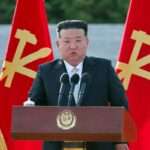 Kim Jong Un giving a speech during a visit to the Academy of National Defence