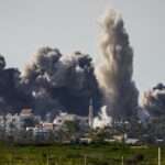 an Israeli bombardment inside the Gaza Strip as seen from southern Israel