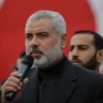 Ismail Haniyeh speaks in front of a Turkish flag 1 768x589 1