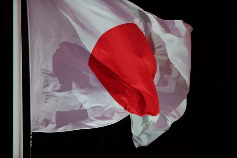 The flag of Japan waves during the opening ceremony 768x512 1