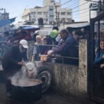 palestinians line up for a free meal in rafah gaza strip 768x512 1 1